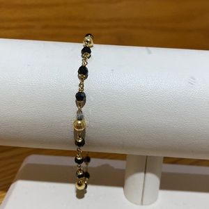 COPY - 14 k bracelet with gold beads and black onyx